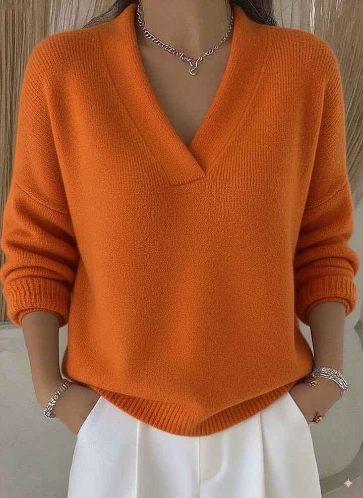 Women’s Soft V-Neck Loose Knit Sweater – Casual Autumn & Winter Pullover in vibrant orange color.