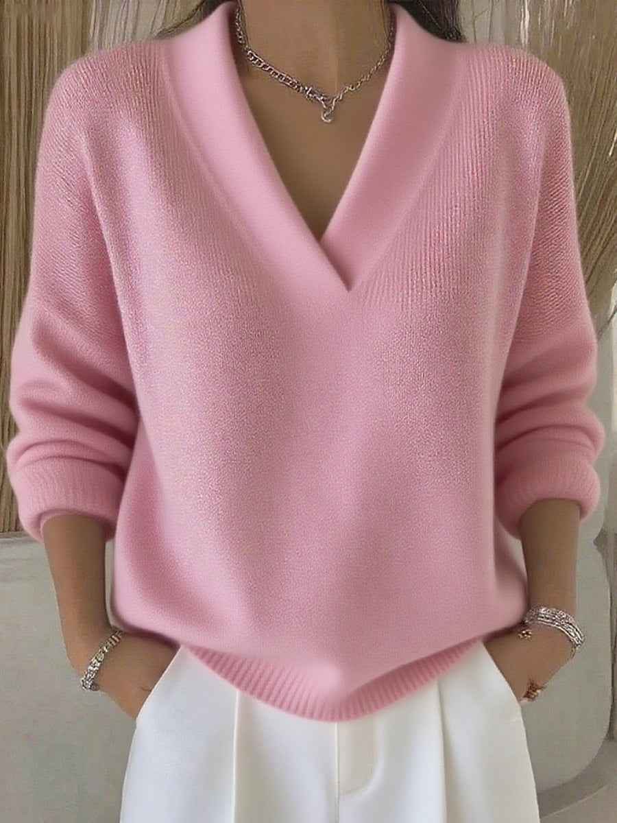 Women’s Soft V-Neck Loose Knit Sweater – Casual Autumn & Winter Pullover in pink color.